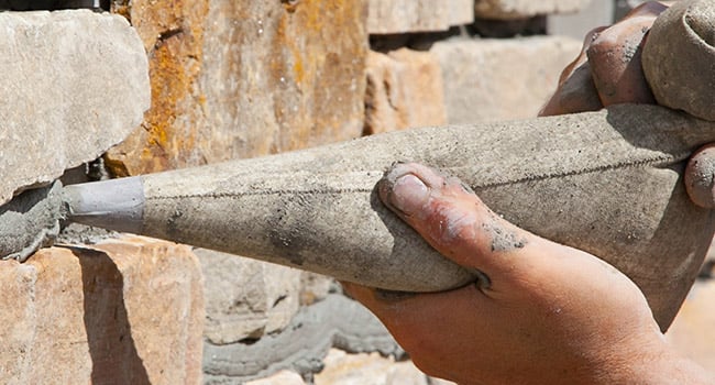 filling grout joints with lightweight pumice pointing mortar